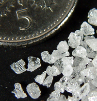 Anti-bumping granules with 5p coin for scale