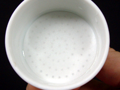 A Buchner funnel with correctly fitting, dampened filter paper