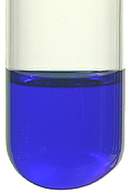 Initial blue precipitate dissolves to give a royal blue solution