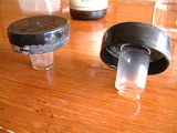 The wrong way. These tops are contaminating the bench - and which top goes with which bottle?