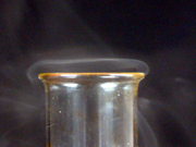 White, steamy fumes of hydrogen halide gas