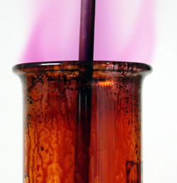 Thermal decomposition of hydrogen iodide showing purple iodine vapour and brown iodine solution