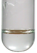 A pale green solution