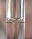 A correctly filled pipette showing the bottom of the meniscus on the line