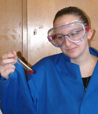 A student wearing goggles
