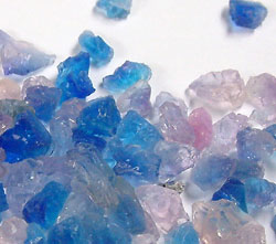 Self-indicating silica gel showing dry blue crystals and wet pink crystals