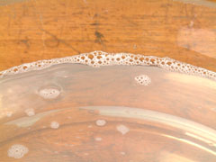 Soft water with soap showing clear solution and lather