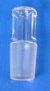 A stopper - fairly obvious!, but never completely seal heated glass apparatus