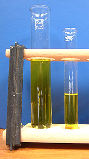A test tube on the right and the wider bore boiling tube on the left
