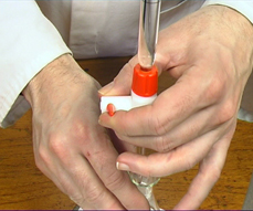 Burette tap and flask being handled correctly