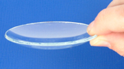 A watch glass viewed from the side