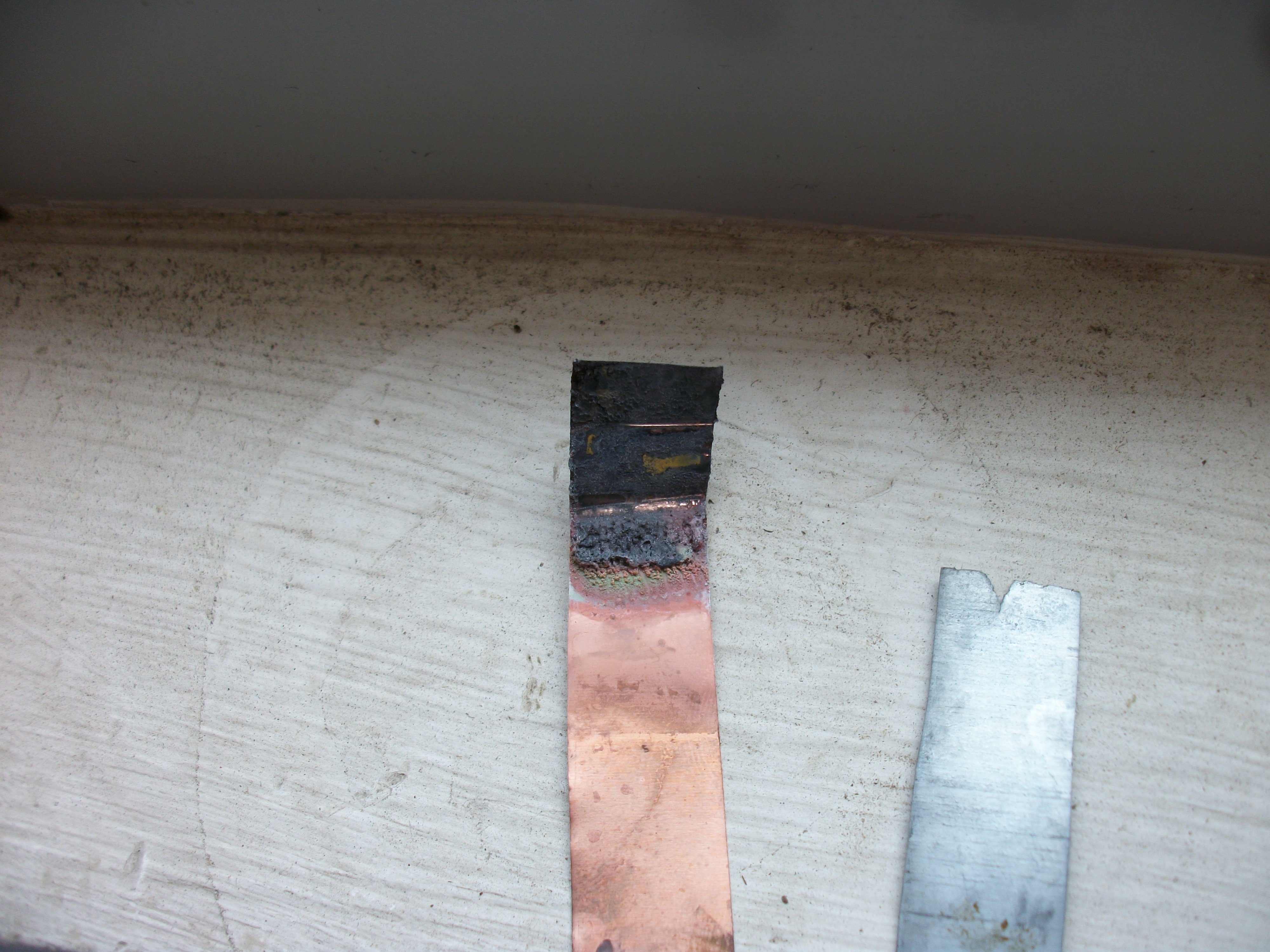 9-Oxidation_and_Reduction_Photos/15 oxidized cu with zn oxide at end.JPG